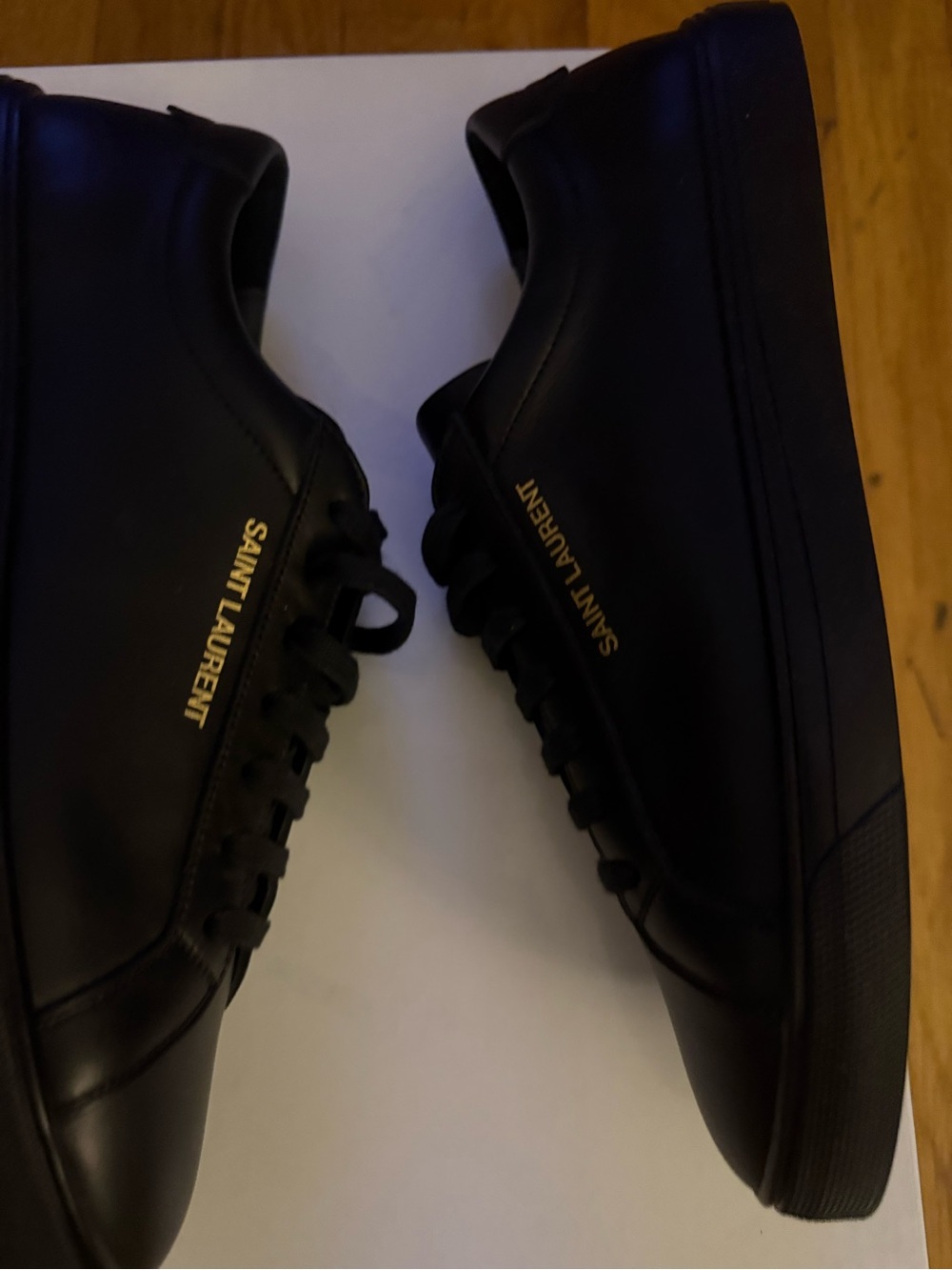 Saint Laurent Black Leather Sneakers with Gold Logo Text